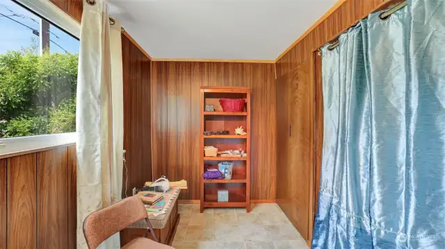 Bonus room off primary bedroom offers additional closet space, storage space and washer/dryer hook-ups.