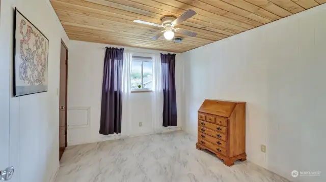 Bedroom on lower level offers huge walk-in closet.