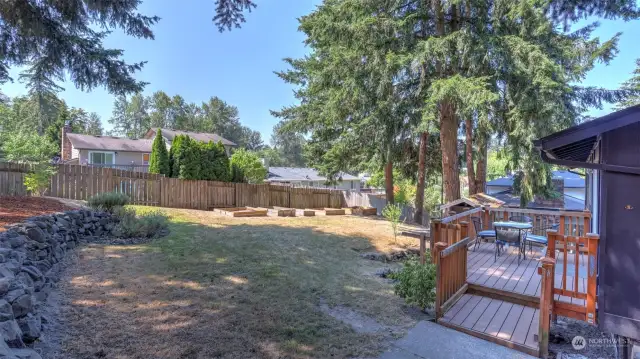 Step outside to the sprawling and spacious back yard.