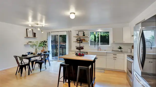 Dining room is just off the kitchen for easy serving at meal time with direct access to the back deck.