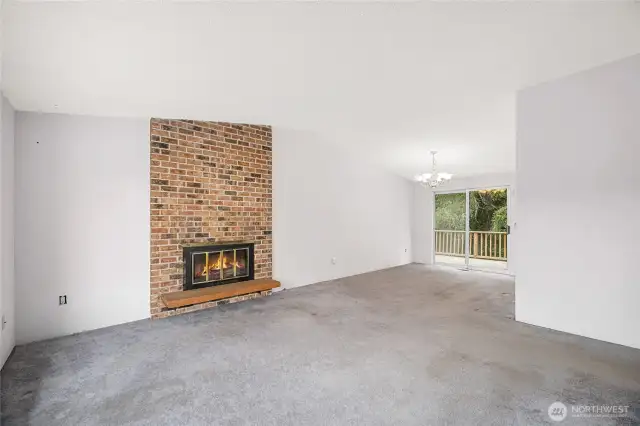 Dining area flows into deck, great for entertaining.