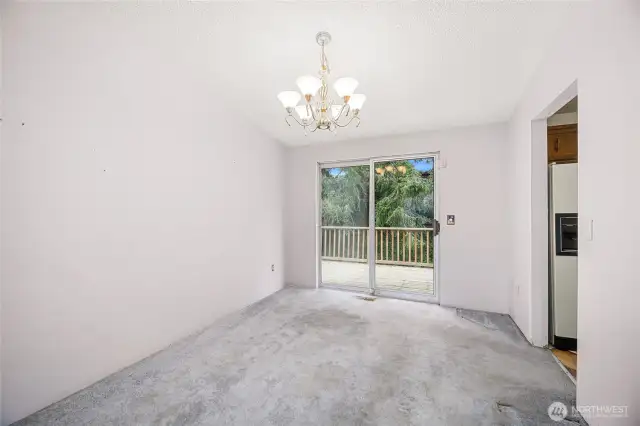 Dining area with sliding door to West facing deck.