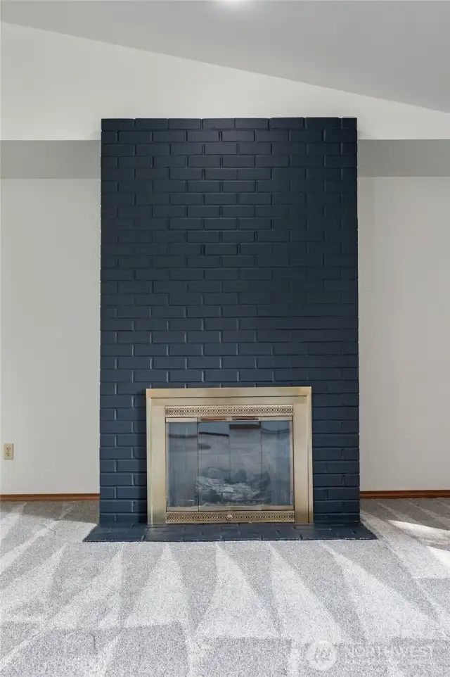 Newly painted gas fireplace