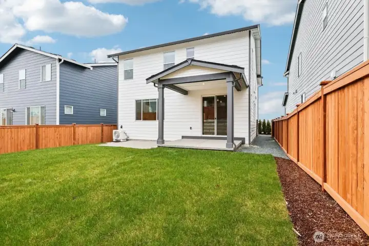 Back yard with covered patio