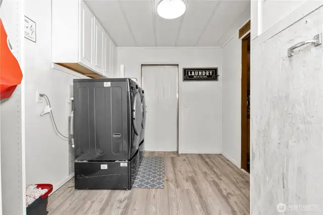 The spacious laundry room gives you plenty of room to move around—making laundry day just a little bit easier and a lot more pleasant.