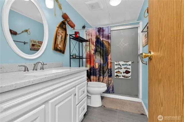 Guest Bath has a walk in shower.