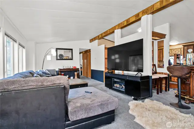 The cozy, open living floor plan has plenty of space for all your favorite furniture—or can stay airy and open if you love a minimalist touch.