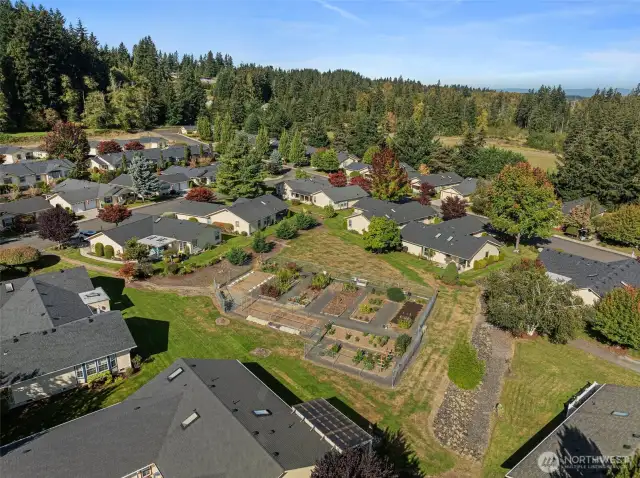 Home with Southern view of common areas and Community Gardens...