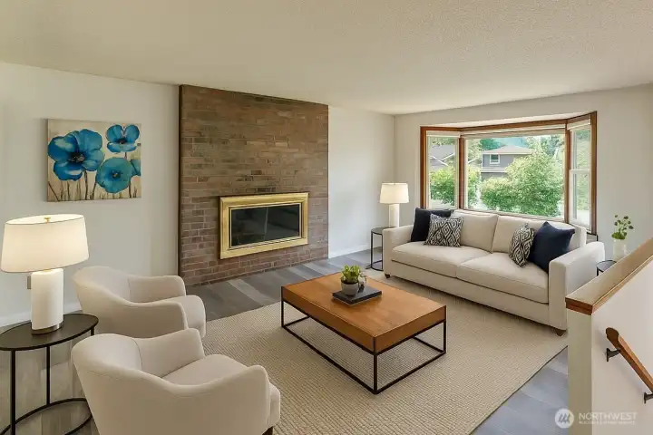 Virtual staged spacious living room with new LVP flooring