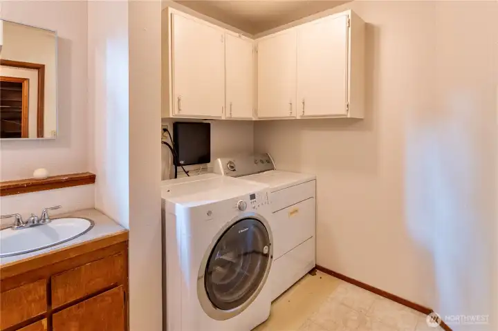 Downstairs laundry room shared with 3/4 bath