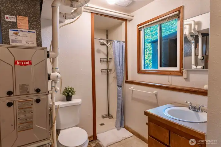 Downstairs 3/4 bath shared with laundry room