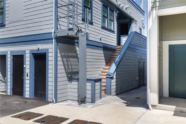 Stair access to unit from designated parking space