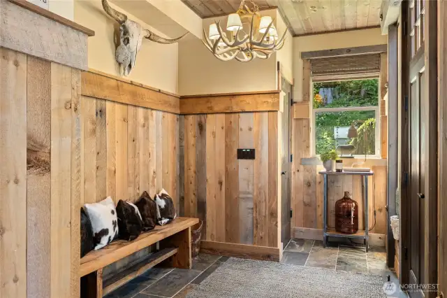 A functional foyer sets the tone, welcoming you into this Trailside home where distinctive finishes evoke timeless old-world charm.