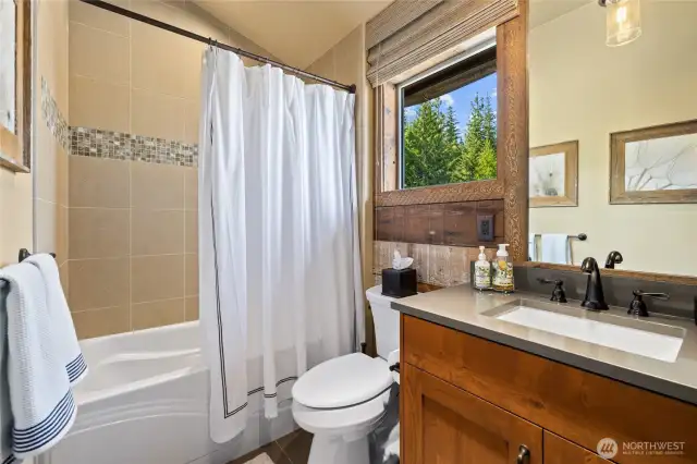 Shared full bath on upper level.