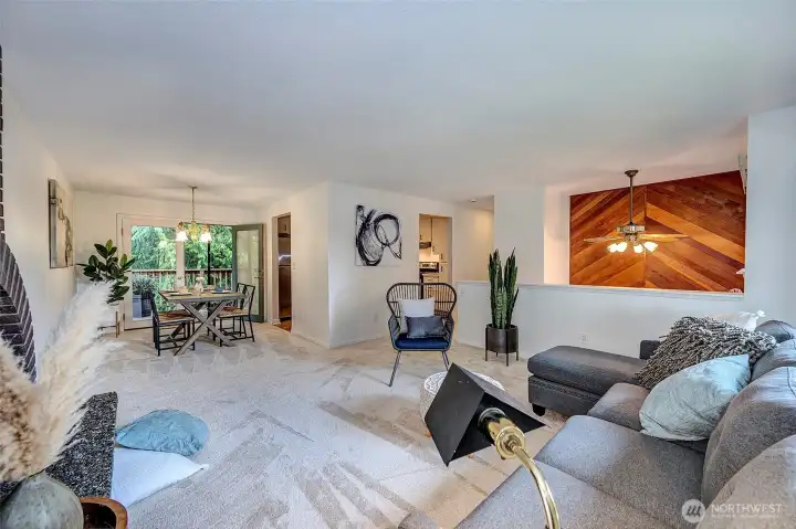 Open Living Room Area With Dining Room. New Carpet & Paint Throughout.