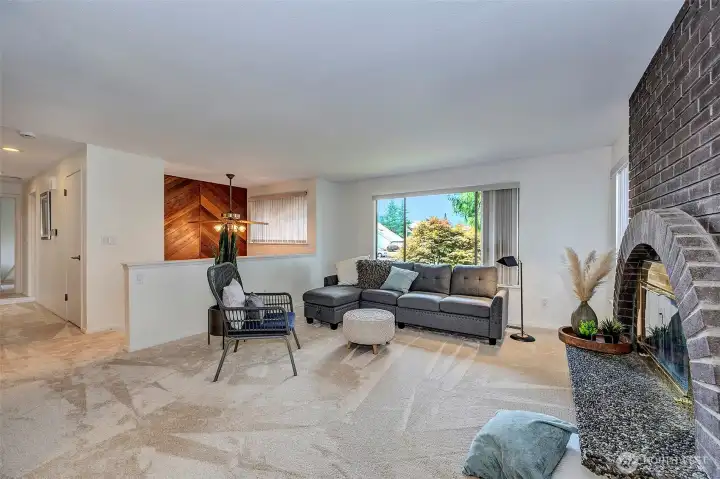 Brick Fireplace And Open Living Area.