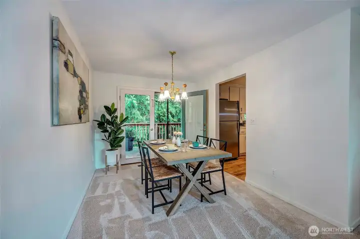 Formal Dining Area w/Slider To Private Deck Area.