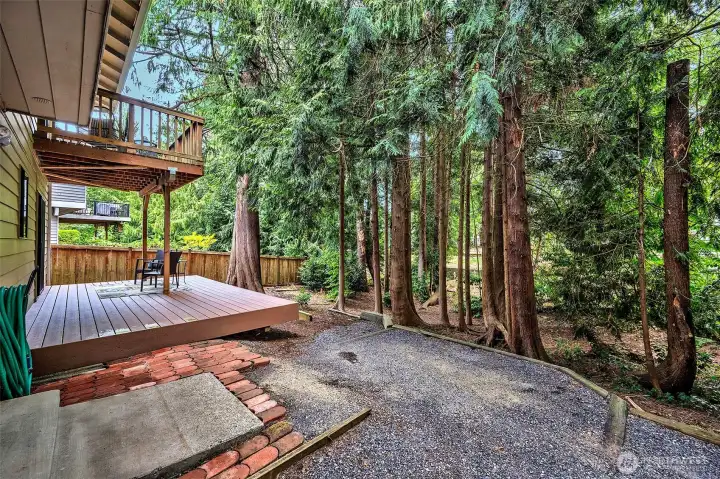 Another View Of Back Of The House Showing Both Decks And Private Park Like Yard.