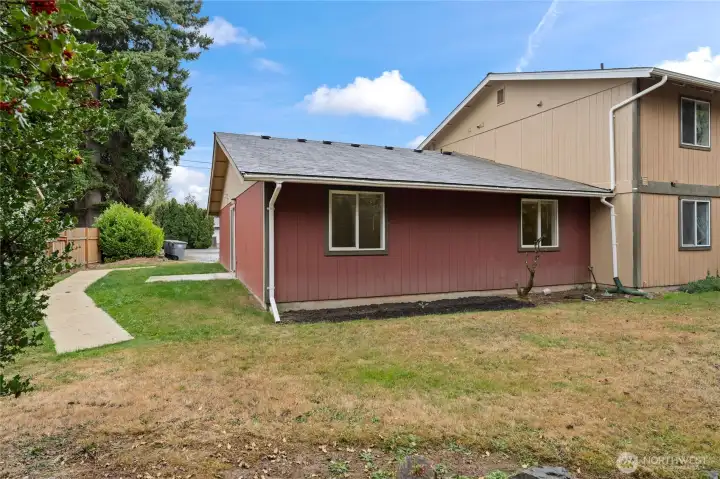 Back side of unit, has common area