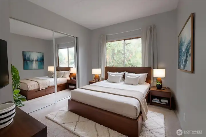 Virtually staged bedroom #2. Amazing natural light and storage in this room.  Just a coat of paint and new carpeting is all this room needs.