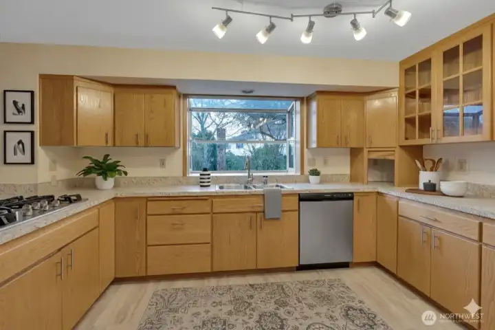 Loads of counterspace and beautiful cabinetry provides ample storage for all your kitchen needs.