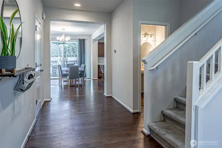 So light and bright! Wide hallway leading you into the main areas of the home