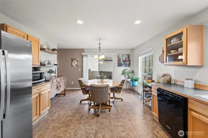 A glass slider leads out to the backyard.