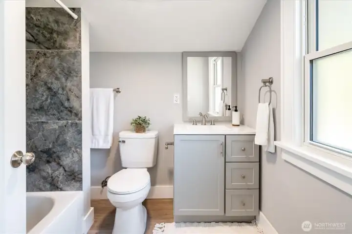 Updated bathroom and plumbing for peace of mind and lasting reliability. Photos from earlier listing in 2025.