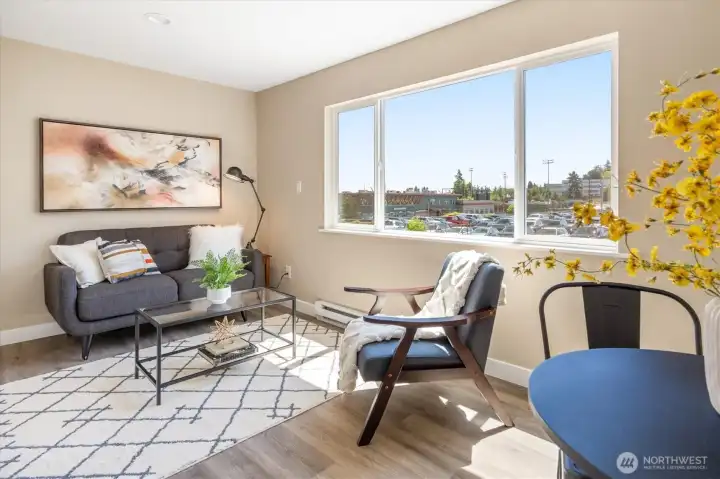 Detached Unit: Bright and airy living space with generous natural light throughout the day. Photos from earlier listing in 2025.