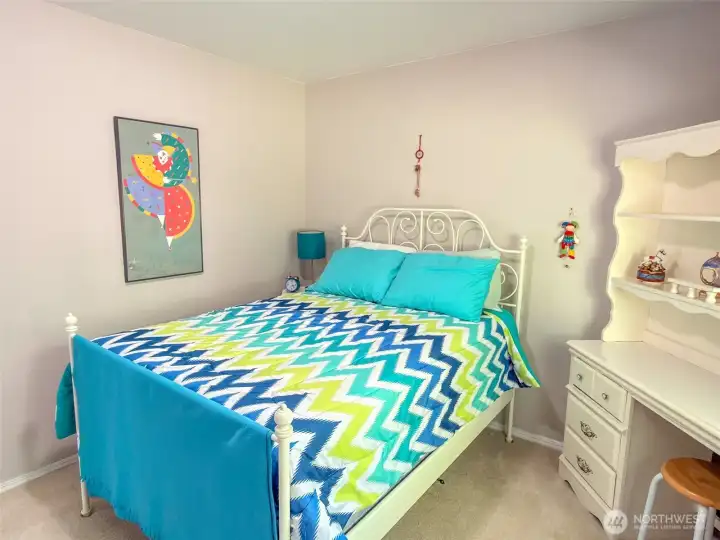 Guest bedroom with garden view.