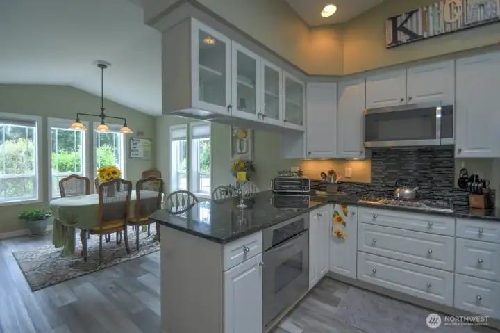 Spacious dining room right off the kitchen.  Propane cooktop and oven #1