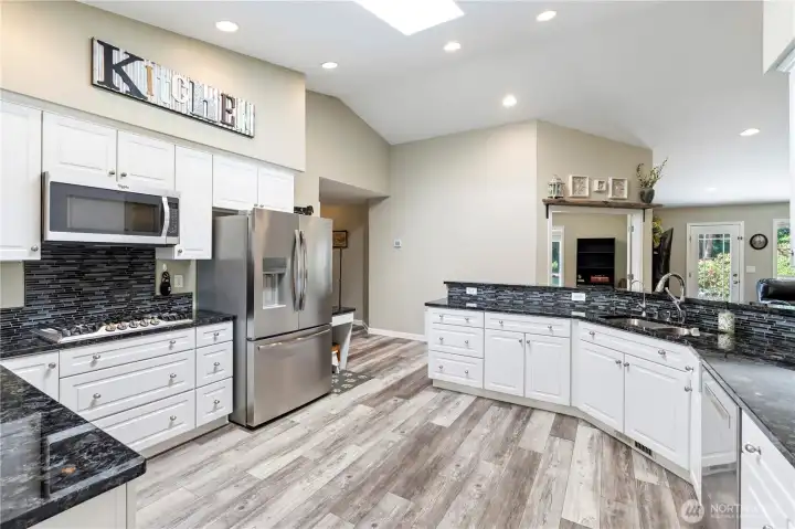 Beautifully updated chef's kitchen with granite countertops