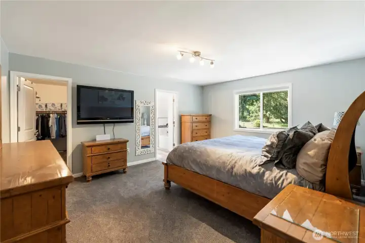 Oversized primary bedroom with walk in closet and 5 piece en-suite
