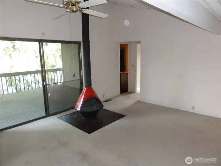 Primary bedroom has fireplace and private deck of the lake. Primary bathroom has soaking tub and sauna.