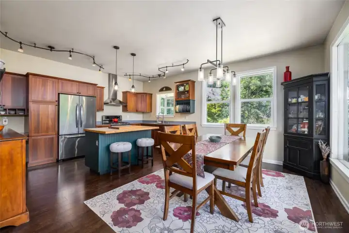 Beautiful kitchen with stainless appliances, butcher block center island, incredible lake views.
