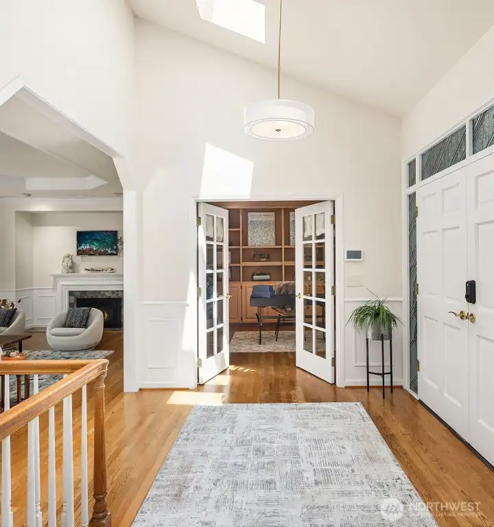 Vaulted ceilings + skylight welcomes you