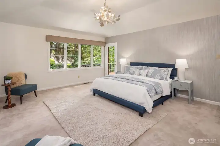 Oversized primary suite opens to private deck + remote control blinds
