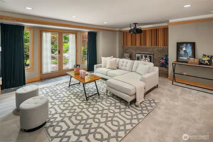 Dedicate Theatre room w/Projector + Screen; automatic blackout drapes, fabric sound proofing walls + ceilings + wet bar