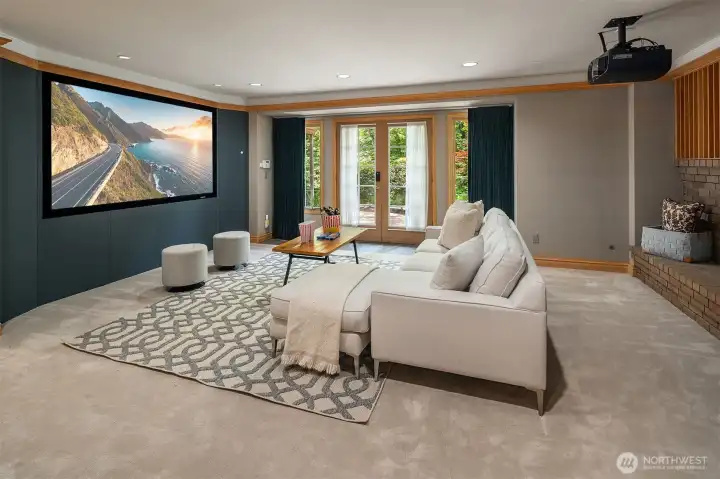 Projector + Screen included with the home sale.  accent theatre lighting + fabric soundproofing walls + ceiling
