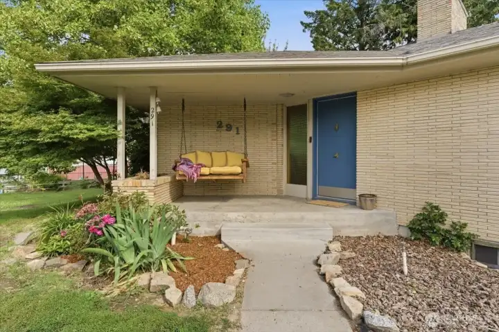 Inviting porch swing and front patio Inviting porch swing and front patio