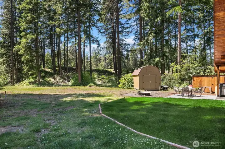 10x20 storage shed in back yard along with large wood shed to keep all your firewood dry year around.