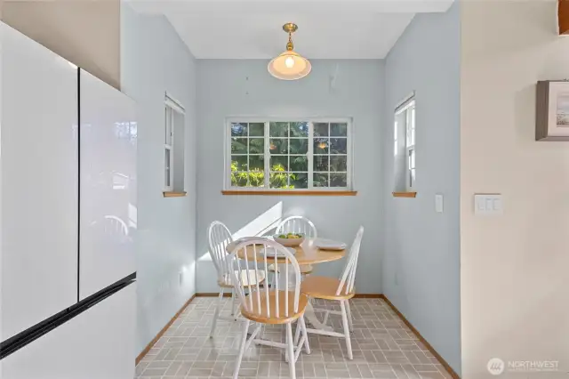 Darling kitchen with breakfast nook.