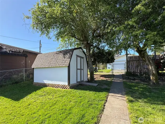 Nicely Fenced Back Yard with Shed