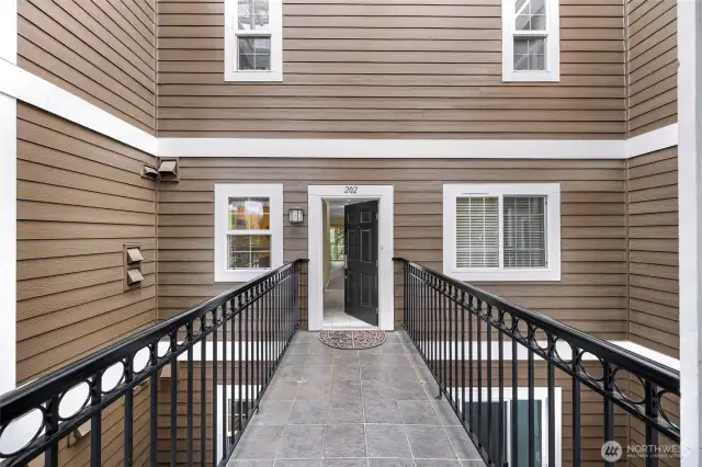 Secure elevator access brings you to this second level condo with private and fully covered entry