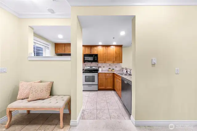 Kitchen and main entry view from the second bedroom