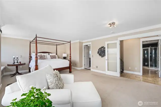 Another view of the primary bedroom suite.