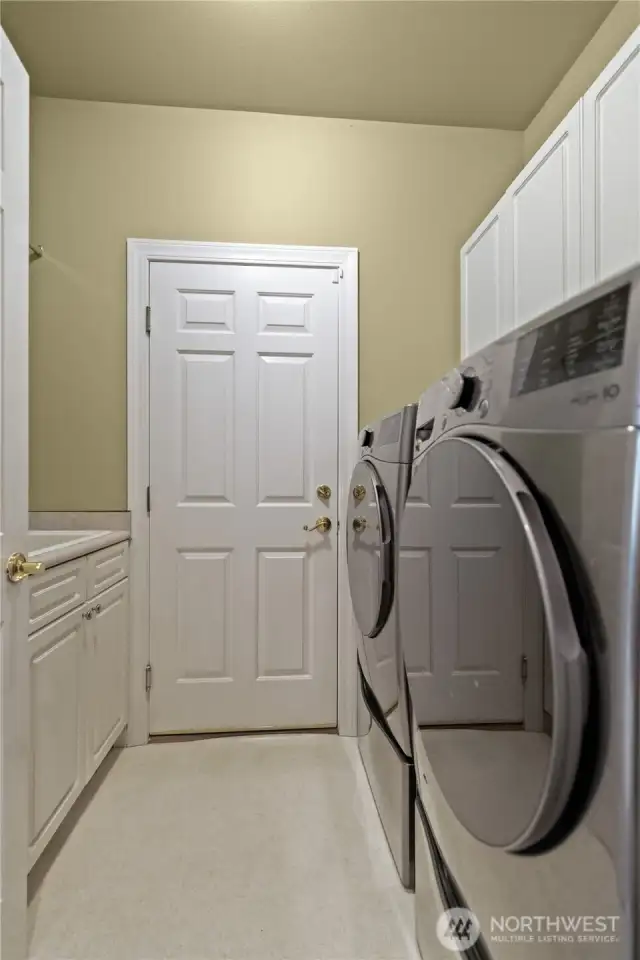 Mud room conveniently located off of double car garage