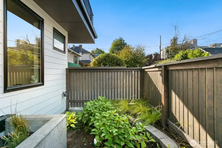 Entry area has a fully-fenced yard area.
