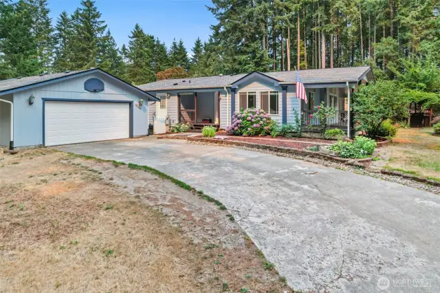 Front of house with detached garage