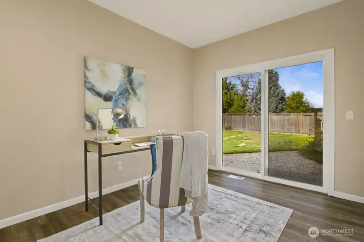 Features a slider for direct backyard access.